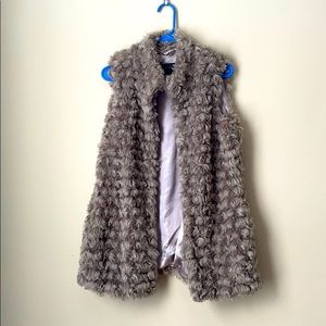 Beautiful vest/jacket. Like new.